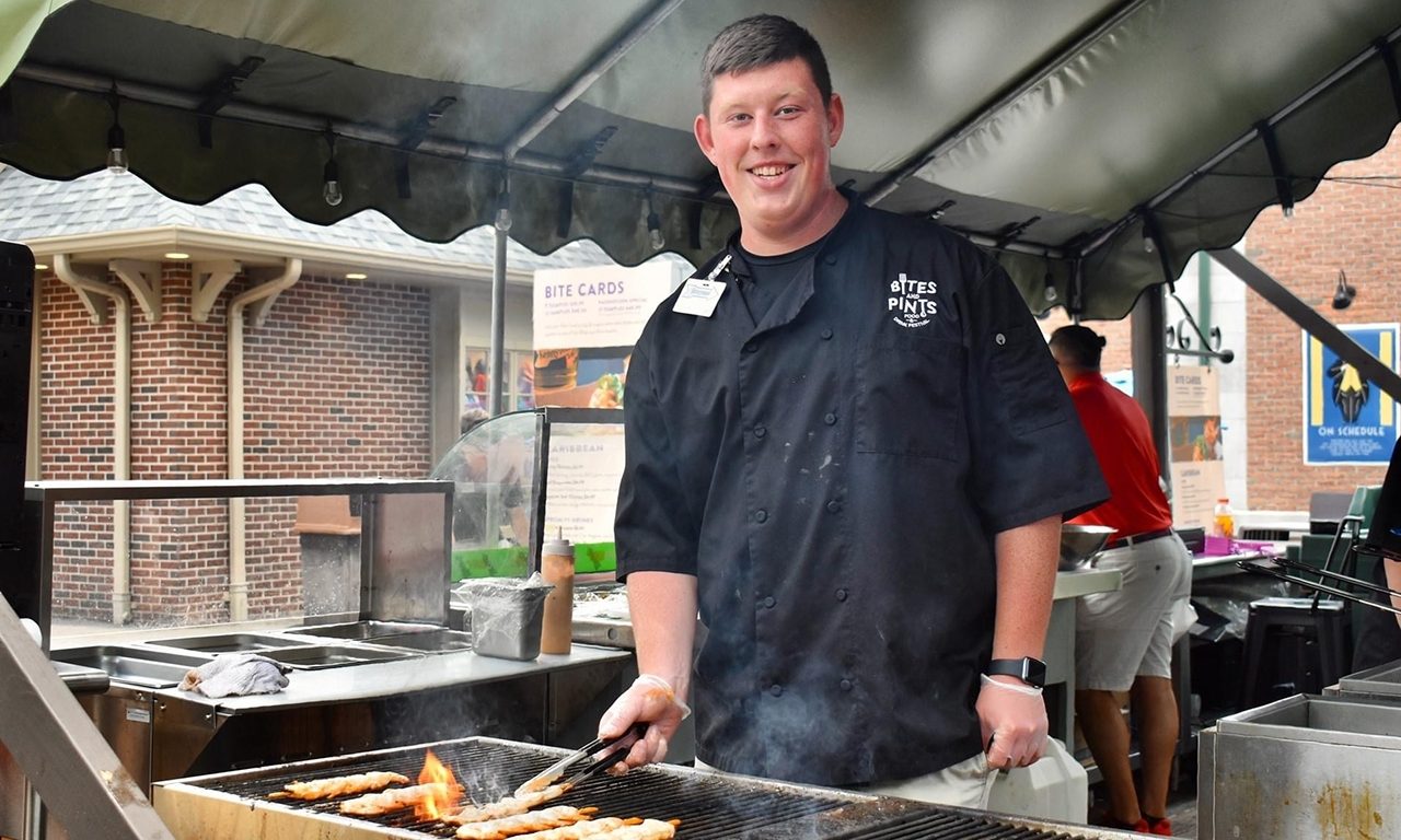 A Food and Beverage Team Member cooking 